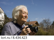 camera senior active photo pensioner. Стоковое фото, фотограф Maximilian Boschi / PantherMedia / Фотобанк Лори
