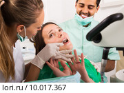 Terrified client and dental clinic. Стоковое фото, фотограф Яков Филимонов / Фотобанк Лори