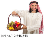 Arab man with fruits isolated on white. Стоковое фото, фотограф Elnur / Фотобанк Лори