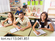 Young students studying in the classroom. Стоковое фото, фотограф Яков Филимонов / Фотобанк Лори