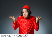 Man wearing red fez hat. Стоковое фото, фотограф Elnur / Фотобанк Лори