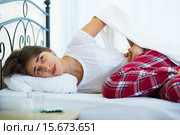 Teenage girl having belly pain and taking pills. Стоковое фото, фотограф Яков Филимонов / Фотобанк Лори