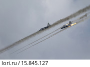Штурмовики Су-25СМ ВКС России наносят удар неуправляемыми ракетами С-8КОМ. Редакционное фото, фотограф Михеев Алексей / Фотобанк Лори