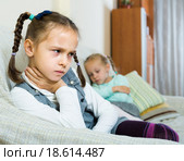 Offended girls sitting apart at home. Стоковое фото, фотограф Яков Филимонов / Фотобанк Лори
