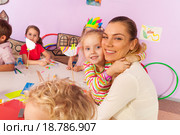 Воспитательница и дети в детском саду. Стоковое фото, фотограф Сергей Новиков / Фотобанк Лори
