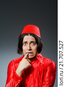 Man wearing red fez hat. Стоковое фото, фотограф Elnur / Фотобанк Лори