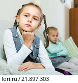 Offended girls sitting apart at home. Стоковое фото, фотограф Яков Филимонов / Фотобанк Лори