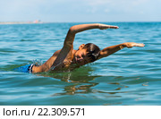 Teenager boy enjoying a swimming in the sea. Стоковое фото, фотограф Валуа Виталий / Фотобанк Лори