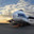Крупнейший в мире грузовой самолет Руслан Ан-124-100 (Россия) на заправке в аэропорту Аль-Аин (ОАЭ, весна 2013), ранним утром на фоне облаков и восходящего солнца. Редакционное фото, фотограф oleg savichev / Фотобанк Лори