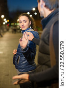 girl asking man to stop bothering. Стоковое фото, фотограф Яков Филимонов / Фотобанк Лори