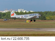 Международный авиационно-космический салон МАКС-2015. Douglas DC-3 / C-47A Skytrain - американский ближнемагистральный транспортный самолет, разработанный в 1935 году предприятием Douglas Aircraft Company. Редакционное фото, фотограф Игорь Долгов / Фотобанк Лори