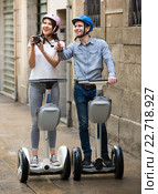 Young couple driving segways. Стоковое фото, фотограф Яков Филимонов / Фотобанк Лори