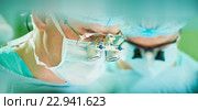 male cardiac surgeon at child cardiosurgery operating room. Стоковое фото, фотограф Дмитрий Калиновский / Фотобанк Лори