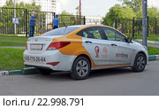 Каршеринг. Автомобиль сервиса поминутной аренды автомобиля Anytimecar в Москве (2016 год). Редакционное фото, фотограф Александр Замараев / Фотобанк Лори