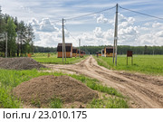 Первые дома построены в новом дачном поселке. Стоковое фото, фотограф Юрий Шурчков / Фотобанк Лори
