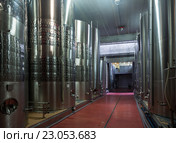 Stainless cisterns with fermenting wine in fabric. Стоковое фото, фотограф Яков Филимонов / Фотобанк Лори
