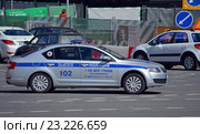 Полицейский автомобиль Scoda Octavia III 1-го специального батальона ДПС ГИБДД на спецтрассе в Москве (2016 год). Редакционное фото, фотограф Александр Замараев / Фотобанк Лори