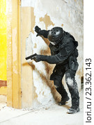 Special forces armed with pistol ready to attack. Стоковое фото, фотограф Дмитрий Калиновский / Фотобанк Лори
