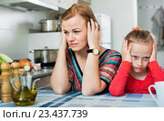 Upset girl and mother have a peeve on each other. Стоковое фото, фотограф Яков Филимонов / Фотобанк Лори