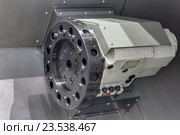 Магазин для автоматической смены шпиндельного инструмента токарного станка с ЧПУ. Стоковое фото, фотограф Игорь Долгов / Фотобанк Лори