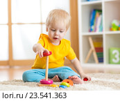 cute kid playing with color toy indoor. Стоковое фото, фотограф Оксана Кузьмина / Фотобанк Лори