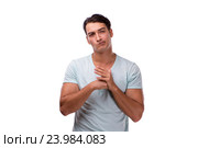 Young handsome man isolated on the white background. Стоковое фото, фотограф Elnur / Фотобанк Лори