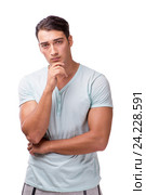 Young handsome man isolated on the white background. Стоковое фото, фотограф Elnur / Фотобанк Лори
