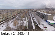 Полет над Бульваром Советов в городе Сегежа, республика Карелия. Зима. Ускорение в середине ролика (2016 год). Редакционное видео, видеограф Кекяляйнен Андрей / Фотобанк Лори