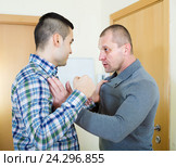 Two adult men having fight. Стоковое фото, фотограф Яков Филимонов / Фотобанк Лори
