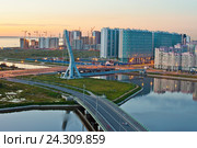 Санкт-Петербург. Квартал Балтийская жемчужина. Автомобильный мост имени Ахмата Кадырова и вантовый мост для тепломагистрали через Дудергофский канал (2016 год). Стоковое фото, фотограф Литвяк Игорь / Фотобанк Лори