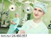 male cardiac surgeon at child cardiosurgery operating room. Стоковое фото, фотограф Дмитрий Калиновский / Фотобанк Лори