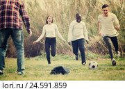 teenage friends playing football. Стоковое фото, фотограф Яков Филимонов / Фотобанк Лори
