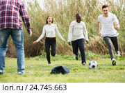 teenage friends playing football. Стоковое фото, фотограф Яков Филимонов / Фотобанк Лори