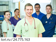 Hospital medic staff. young surgeon doctors team at operation room. Стоковое фото, фотограф Дмитрий Калиновский / Фотобанк Лори