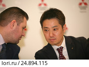 Пресс-конференция официального дистрибьютора автомобилей Mitsubishi на территории России -компании «ММС Рус» (Mitsubishi Motors). Президент и исполнительный директор ООО «ММС Рус» Накамура Наоя. (2017 год). Редакционное фото, фотограф Александр С. Курбатов / Фотобанк Лори