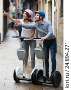 Young couple driving segways. Стоковое фото, фотограф Яков Филимонов / Фотобанк Лори