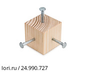 Wooden cube and three steel nailing. Стоковое фото, фотограф Андрей Есин / Фотобанк Лори