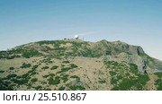 Aerial View Radar Located on the Top Mountain. Стоковое видео, видеограф Discovod / Фотобанк Лори
