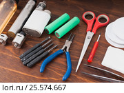 Set to vape. Tools, candy, liquid, RDA, RTA. Стоковое фото, фотограф Сергей Лабутин / Фотобанк Лори