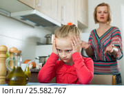 Frustrated woman scolding little girl. Стоковое фото, фотограф Яков Филимонов / Фотобанк Лори
