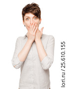 portrait of a young surprised brunette girl on a white background isolated. Стоковое фото, фотограф Константин Лабунский / Фотобанк Лори