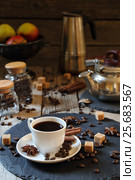 Black coffee with cinnamon, anise and cane sugar. Стоковое фото, фотограф Феликс Хромых / Фотобанк Лори
