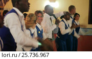 VARADERO, CUBA - DECEMBER 23, 2011: People dancing synchronous. Редакционное видео, видеограф Алексей / Фотобанк Лори