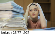 A lot of Paperwork and sad woman. Стоковое видео, видеограф Илья Шаматура / Фотобанк Лори