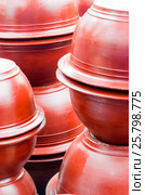 Stack of clay flowerpot. Стоковое фото, фотограф Владимир Докучаев / Фотобанк Лори