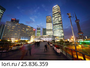 SHANGHAI, CHINA - NOV 6, 2015: Tourists and tall skyscrapers, China tallest skyscraper (Shanghai Tower) height of 630 meters. Редакционное фото, фотограф Losevsky Pavel / Фотобанк Лори