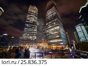 SHANGHAI, CHINA - NOV 6, 2015: Beautiful skyscrapers at night, China tallest skyscraper (Shanghai Tower) height of 630 meters. Редакционное фото, фотограф Losevsky Pavel / Фотобанк Лори