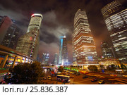 SHANGHAI, CHINA - NOV 6, 2015: Beautiful skyscrapers at night, China tallest skyscraper (Shanghai Tower) height of 630 meters. Редакционное фото, фотограф Losevsky Pavel / Фотобанк Лори