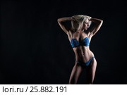Girl with muscles. Стоковое фото, фотограф Виктория Никифорова / Фотобанк Лори