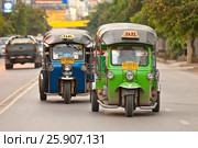 Tuk-tuk taxi, favorite travelers transportation in Chiang Mai, Thailand. Стоковое фото, агентство BE&W Photo / Фотобанк Лори